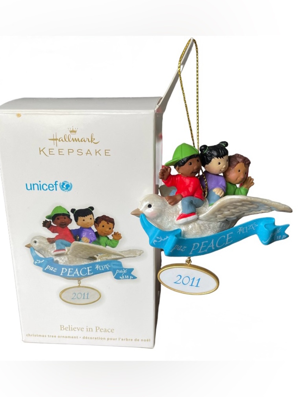 NWOT 2011 Hallmark UNICEF Believe in Peace Ornament